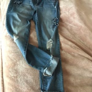 Super cute skinny ankle jean with flower detail